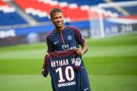 TOPSHOT - Brazilian superstar Neymar pos